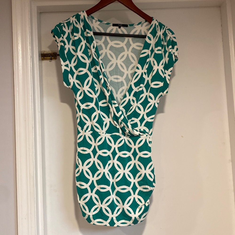 Tart green and white printed top, size M.